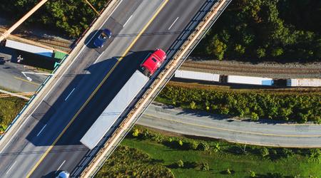 A road bridge with many vehicles