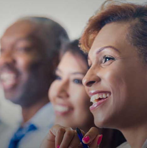 woman smiling in business meeting