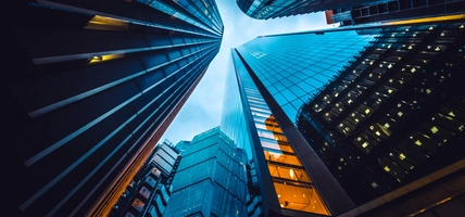 Looking directly up at the skyline of the financial district in central London 