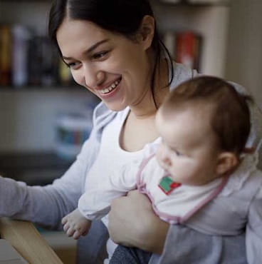 woman holding baby