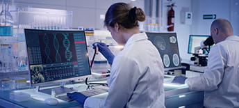 Lab technician at a computer