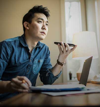 Man (early 30s) working in home office