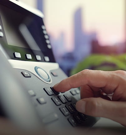 dialing-on-a-deskphone-closeup