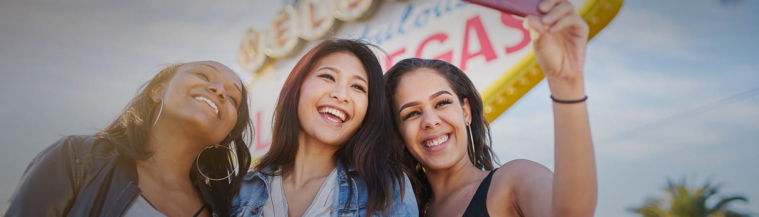 three girls taking selfie