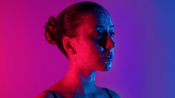 Young female human face with 3d mesh