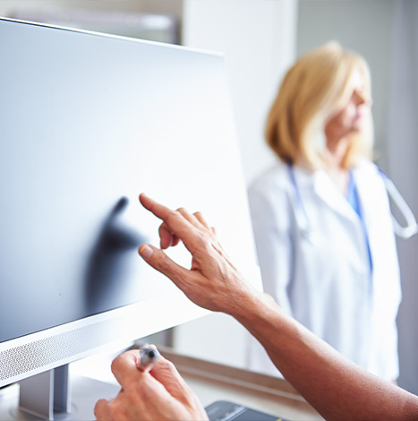 pointing the finger on desktop in healthcare