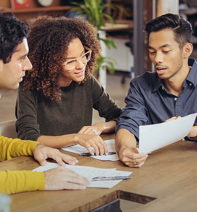 Diverse employees discussing issue