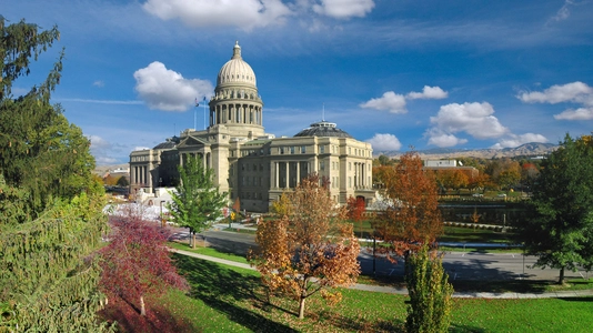 View of Idaho State Capitol in Boise, Idaho from city park.