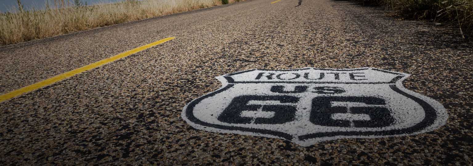 Route 66 marker and car on road, Route 66, Texas, USA