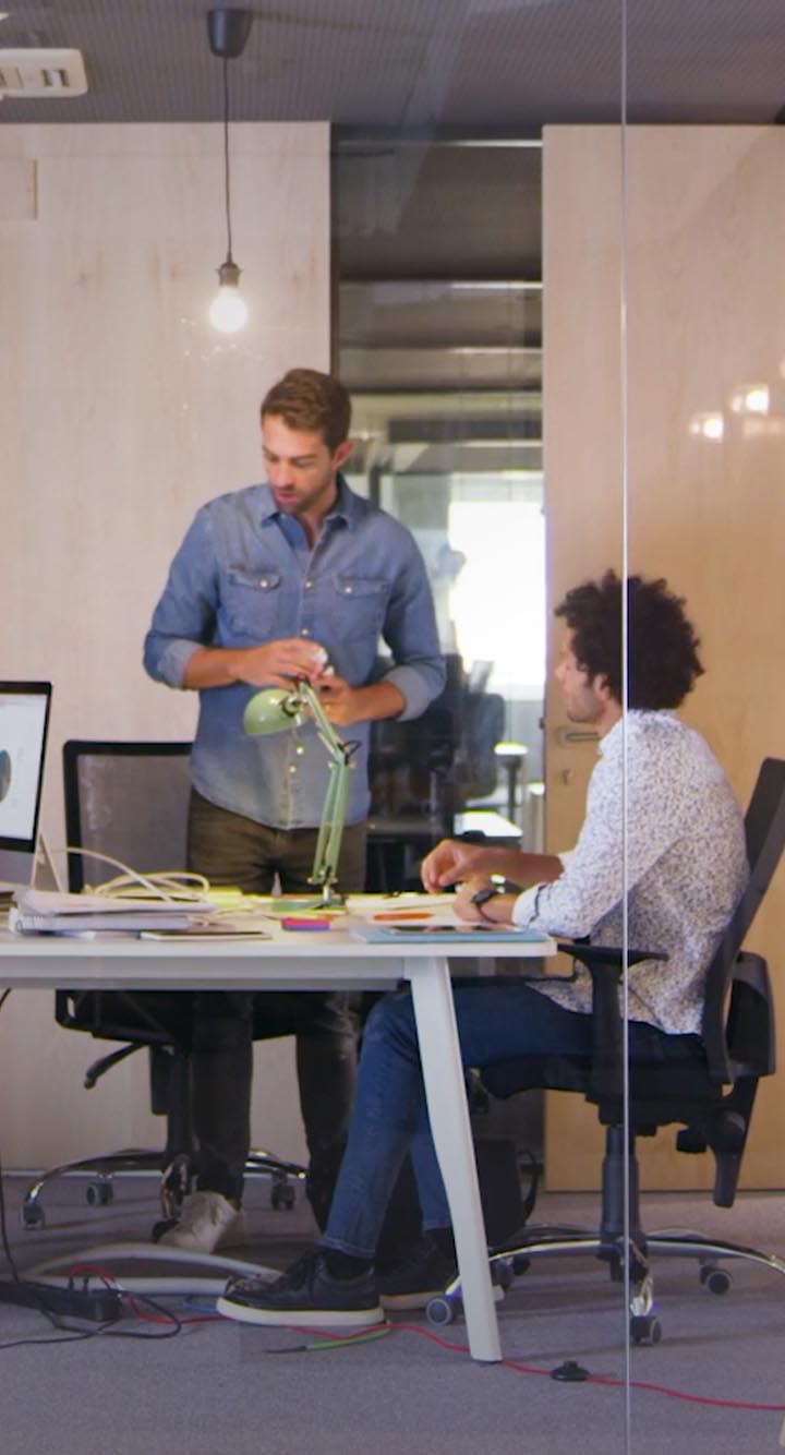 people working in conference room