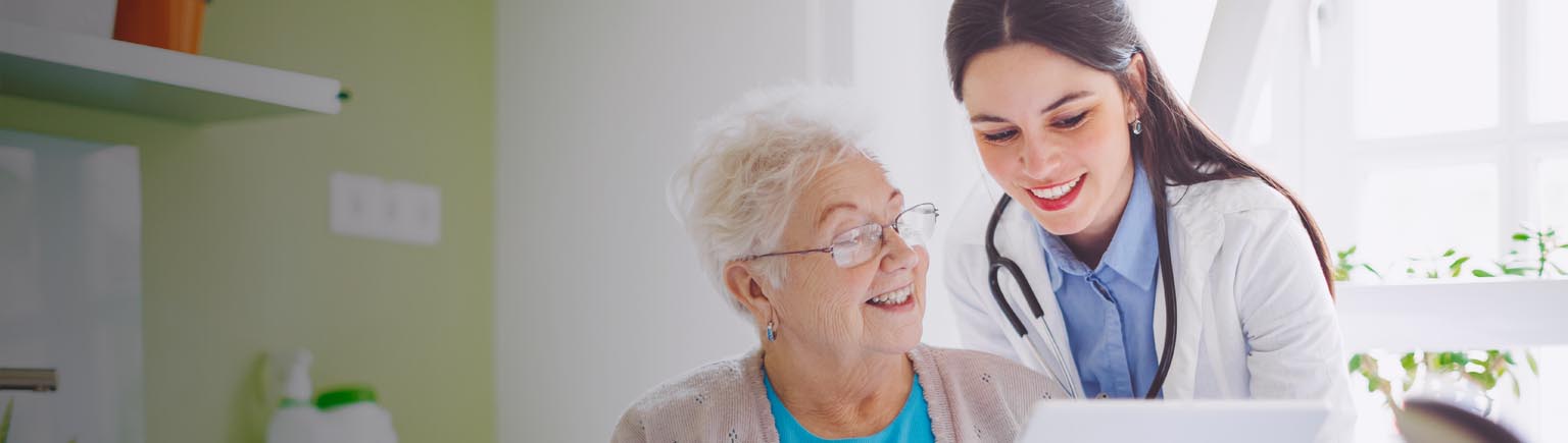 doctor and patient reviewing medical documents