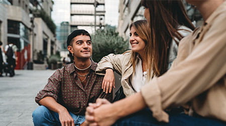 group of young people sitting together