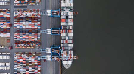 Containers being loaded onto ship