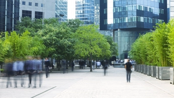 Business People Walking in Modern Financial District