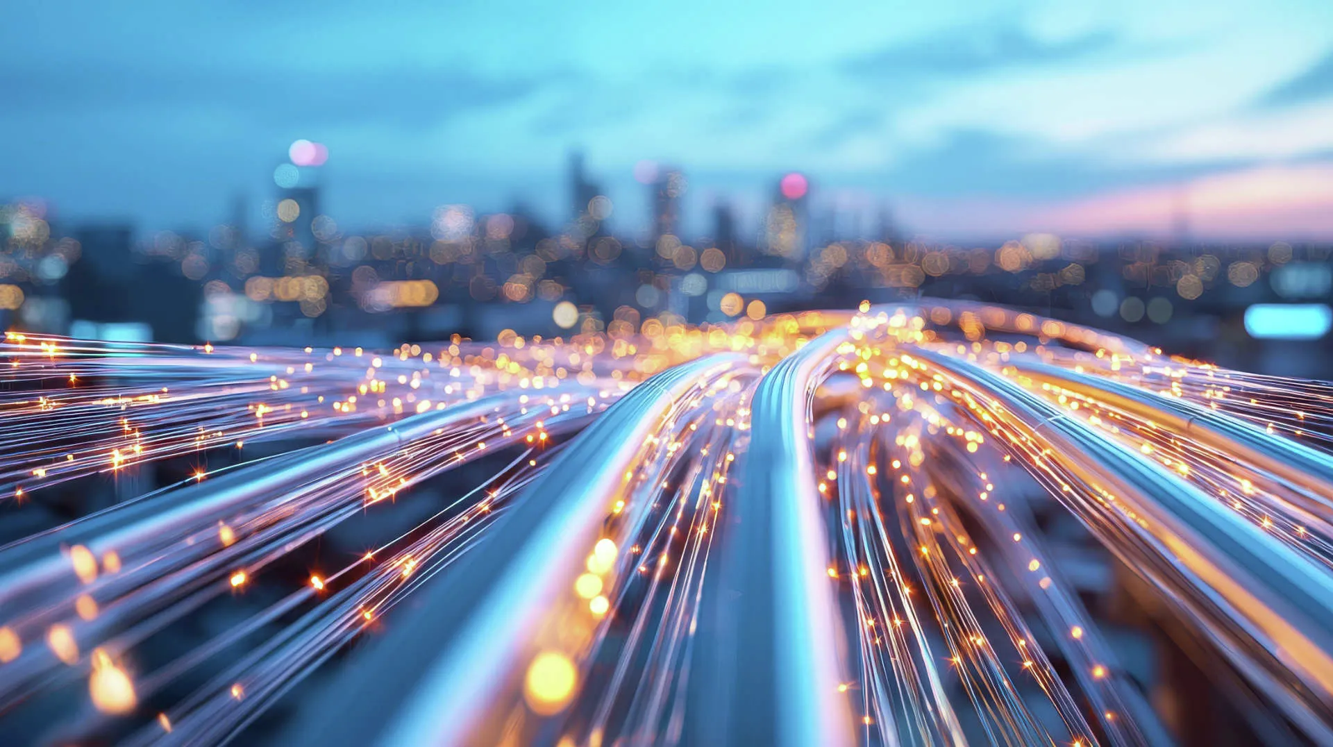 Glowing fiber optic cables stretching toward a blurred city skyline at dusk