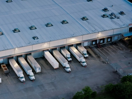 Birdseye Shot of Trucks Parked in Warehouse in Houston, Texas