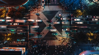 Aerial View of Crossroad and City Traffic at Night 