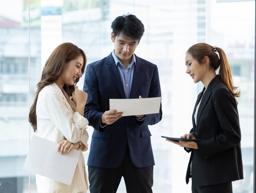 Collaboration of people in the organization. Colleague or business partner discussing plans to work on a project together.
