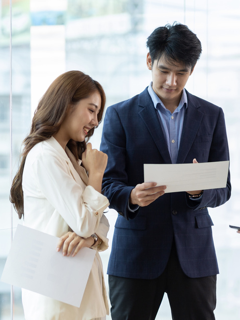 Collaboration of people in the organization. Colleague or business partner discussing plans to work on a project together.