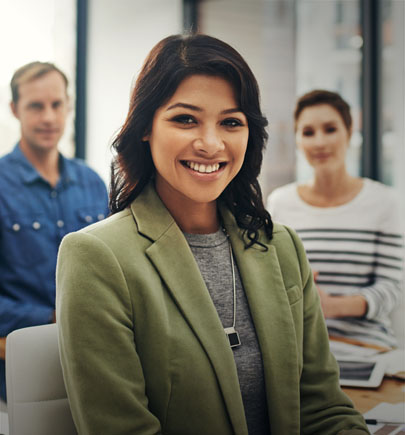 Business team smiling at Camera