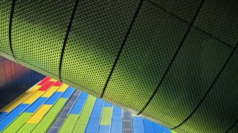 Colorful buildings and motorway overpass in business district