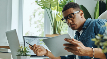 Man reviewing tablet