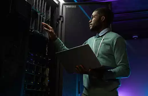 man working in a datacenter