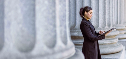 Hispanic latin female lawyer in front of the court house