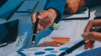 hands reviewing paperwork