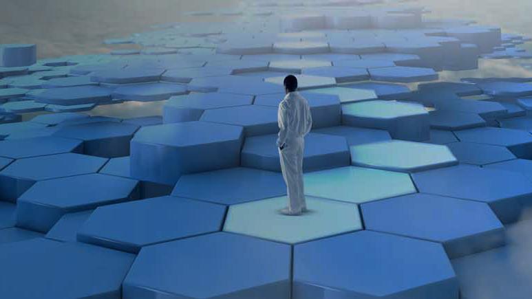 Man standing on 3D hexagon steps