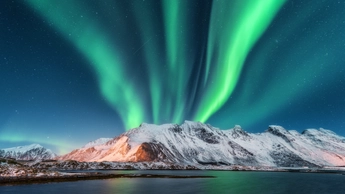 northern lights about mountains