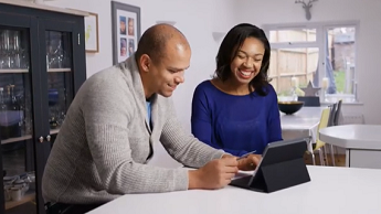 Colleagues working on laptop