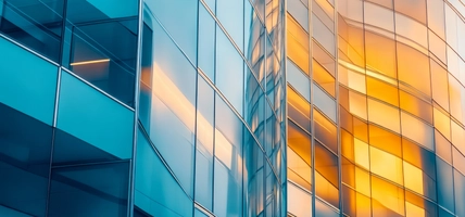 buildings with sun reflecting off them