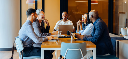 group in conference room for meeting