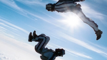 two people skydiving together