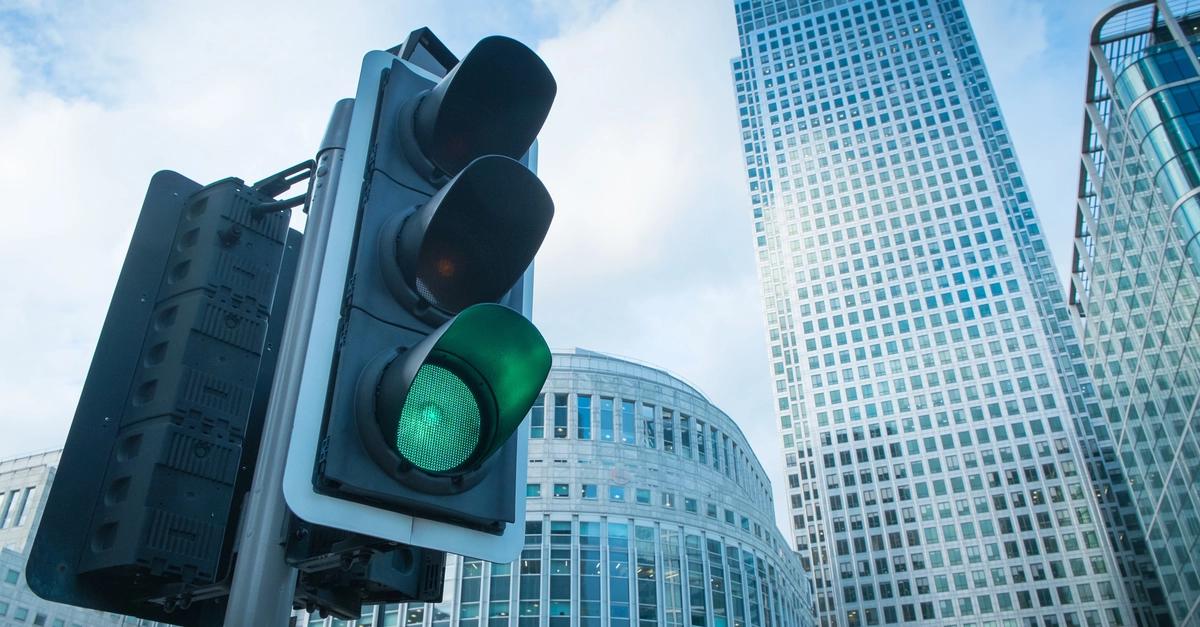 Green, Yellow and Red Traffic Light in the London city\n\n