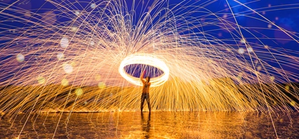 person twirling fireworks