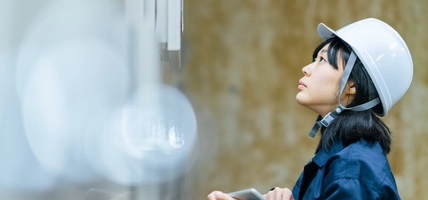 Young female engineer working at engineering facility