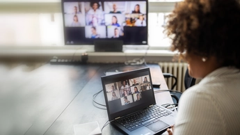 Woman on a video conference meeting at office