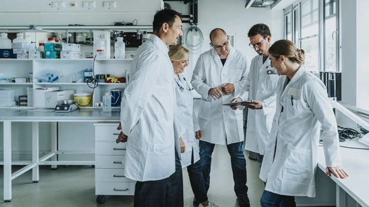 doctors gathered around talking