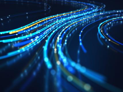 Network data flowing on black background