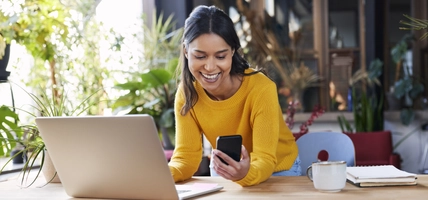 Women is using phone while working