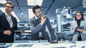 Team Leader Working with robotics engineers on a robot arm project