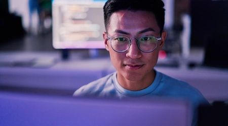 Man is working with codes
