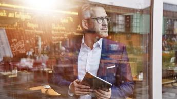 man holding tablet