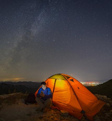 warm tents under the milky way outdoor camping