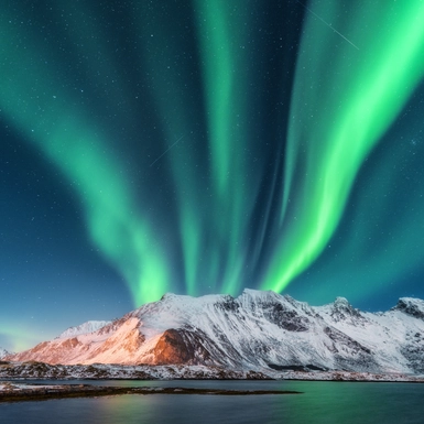 northern lights about mountains