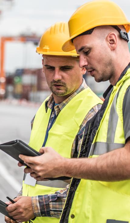 Foremen using digital tablet