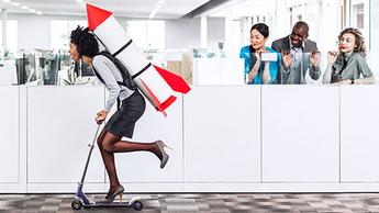 woman riding scooter with rocket on her back