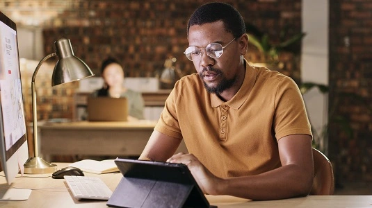 man working at computer